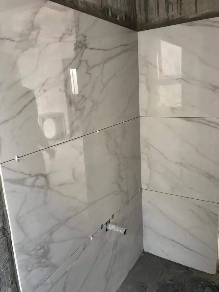 X4 Design and Build marble polishing and tile fixing works